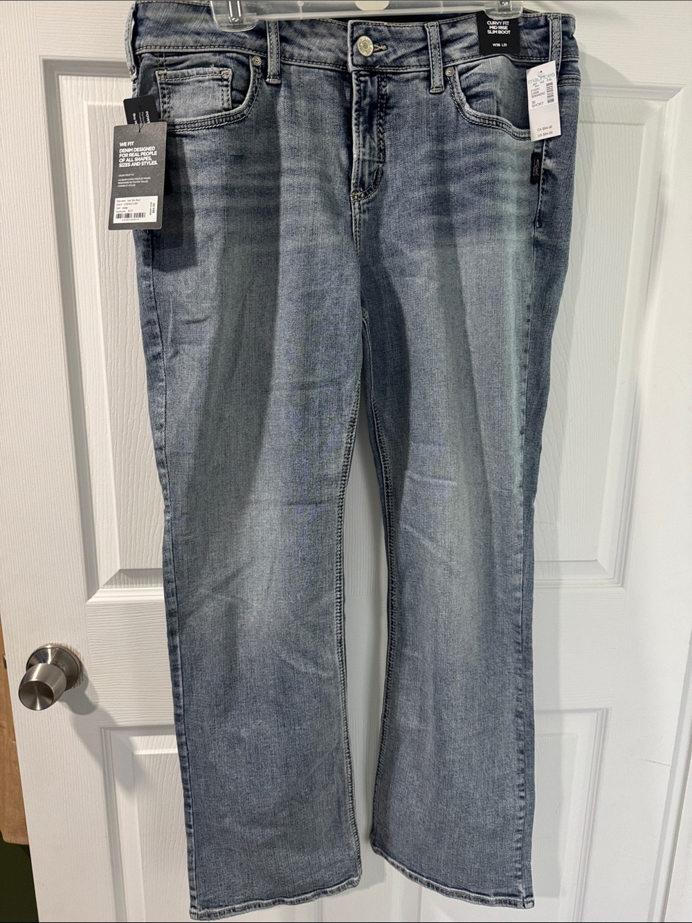 Silver Jeans Women's Boot Cut Jeans in Light Blue Wash